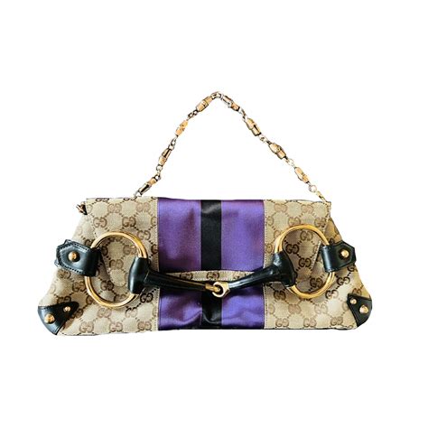 noughties gucci horsebit clutch.